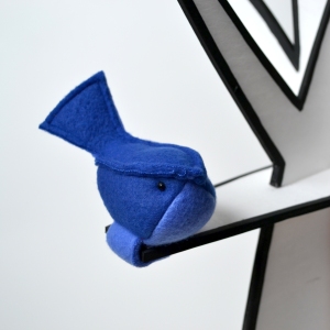 Blue Bird attaches to clothing with magnets